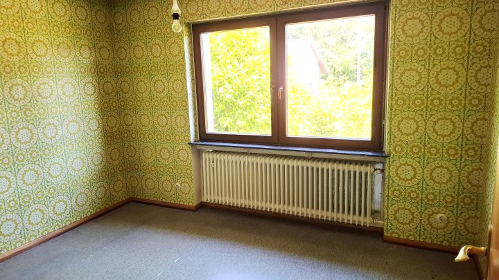 Familienfreundlicher Bungalow mit großzügigem Garten und Teich in Merzig-Schwemlingen