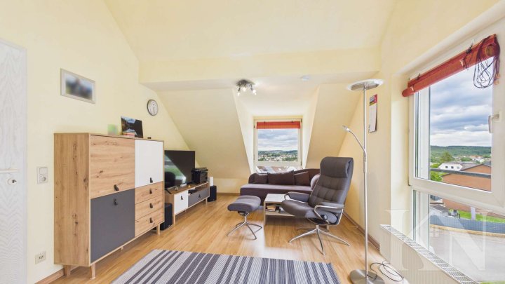 Wohnen in Riegelsberg – Gepflegte Dachgeschosswohnung mit Balkon