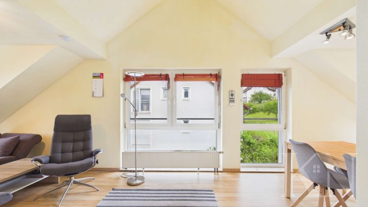 Wohnen in Riegelsberg – Gepflegte Dachgeschosswohnung mit Balkon