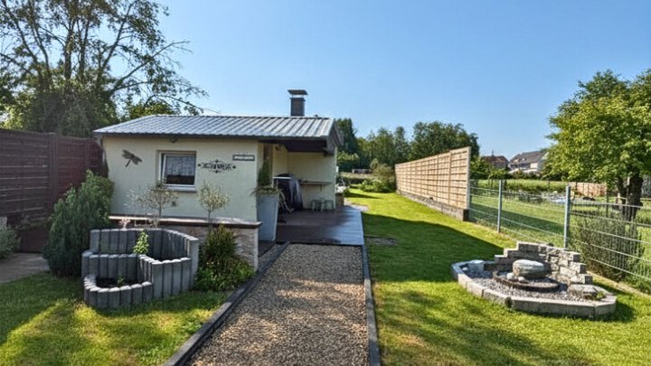 Gepflegtes 2-Familienhaus mit Garten + Garage, teilsaniert