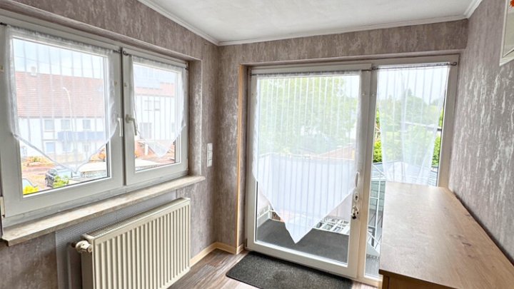 Gepflegtes 2-Familienhaus mit Garten + Garage, teilsaniert