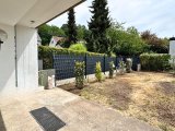 Überdachte Terrasse + Garten