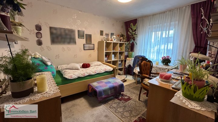 PERL: 4-FAMILIENHAUS MIT GARTEN UND GARAGE IN RUHIGER WOHNLAGE!