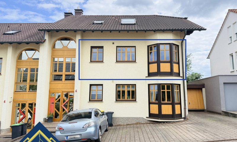 Großzügige Eigentumswohnung mit Balkon, Gartenmitbenutzung und zwei Stellplätzen in Püttlingen