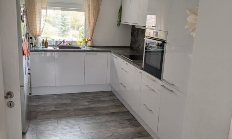 Attraktive Maisonette-Wohnung mit Terrasse, Garten und Einbauküche