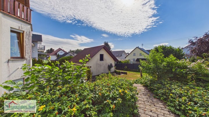 ORSCHOLZ: WOHNHAUS MIT 4 SCHLAFZ., DOPPELGARAGE, GARTEN IN TOP WOHNLAGE!