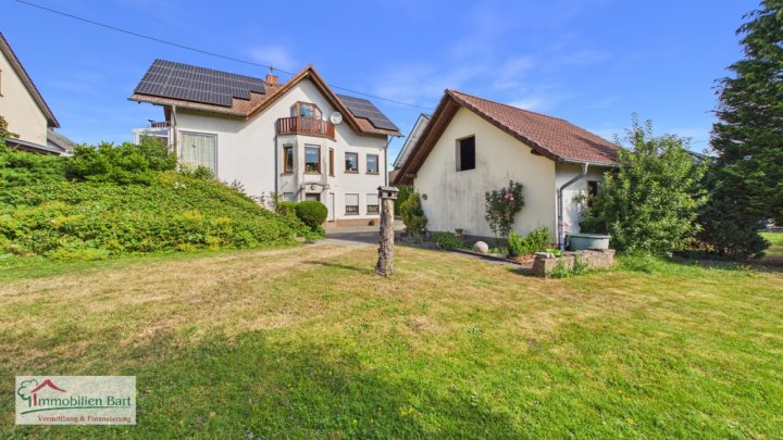 ORSCHOLZ: WOHNHAUS MIT 4 SCHLAFZ., DOPPELGARAGE, GARTEN IN TOP WOHNLAGE!