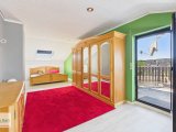 Schlafzimmer mit Zugang zum Balkon