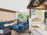 Wohnzimmer mit Zugang zur Terrasse