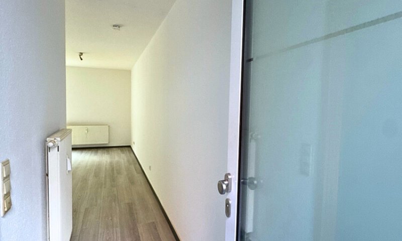 Renovierte 1-ZKB-Wohnung mit Stellplatz + Kellerraum