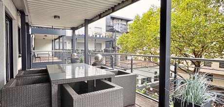 Überdachter Balkon