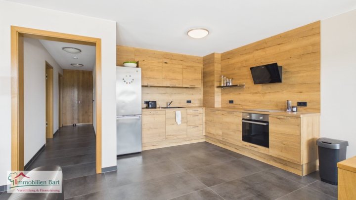 GRENZE L-REMICH: SOFORT VERFÜGBAR! EXKLUSIVE WOHNUNG MIT TERRASSE, GARAGE UND KLEINEM GARTEN!