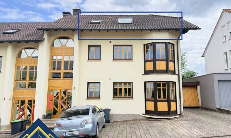 Dachgeschosswohnung mit Balkon, Einbauküche & Gartenanteil in Püttlingen zu verkaufen