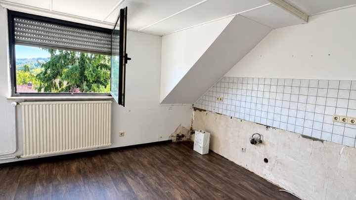 Charmantes 1-2 Familienhaus in Saarbrücken-Herrensohr -  Wohnen mit vielfältigen Möglichkeiten