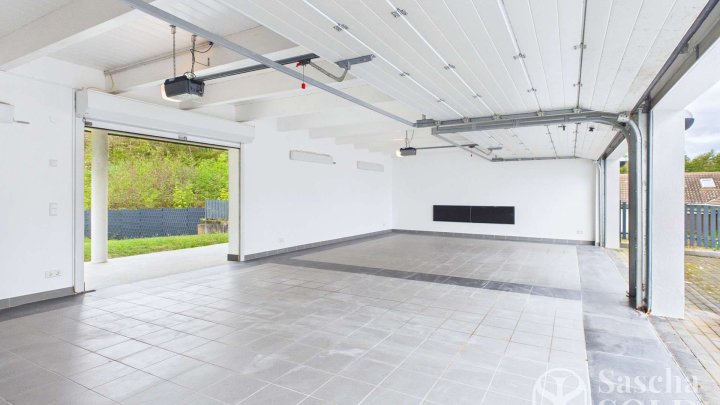 Villa in Bestlage von St. Ingbert – mit Parkgarten, großzügigem Wintergarten, Hallenbad und Sauna