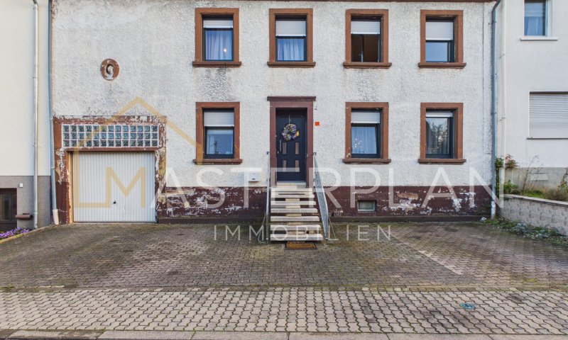 Reihenmittelhaus mit viel Platz, Garten und Ausbaupotenzial