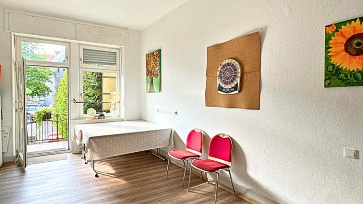 Bestens vermietetes Wohn- + Geschäftshaus mit Garagenpark in Top-Lage und -Zustand