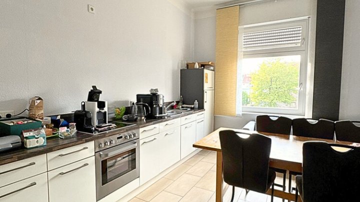 Bestens vermietetes Wohn- + Geschäftshaus mit Garagenpark in Top-Lage und -Zustand
