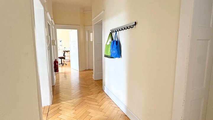 Bestens vermietetes Wohn- + Geschäftshaus mit Garagenpark in Top-Lage und -Zustand