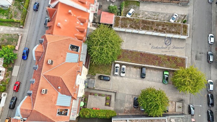 Bestens vermietetes Wohn- + Geschäftshaus mit Garagenpark in Top-Lage und -Zustand