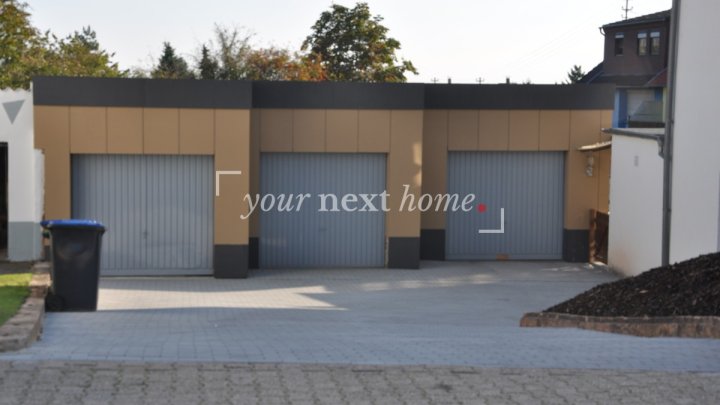Erdgeschosswohnung mit schöner Aussicht und Garage
