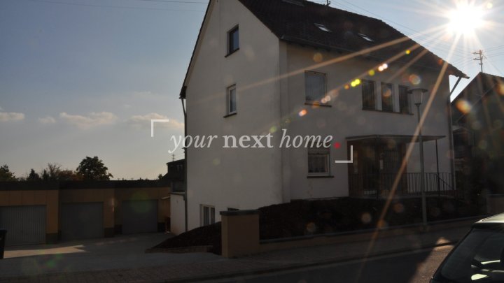 Erdgeschosswohnung mit schöner Aussicht und Garage