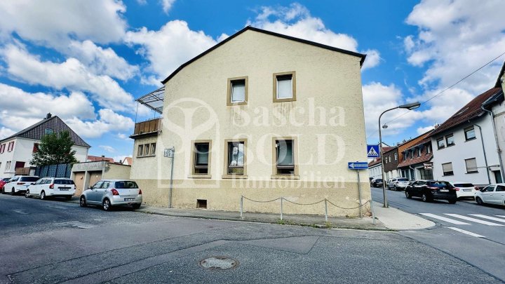 Für Investoren: Wohn- und Geschäftshaus in St. Ingbert – mit Wohnung, Gewerbe, Garten und Garagen