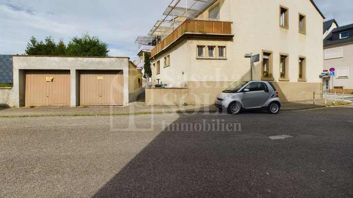 Für Investoren: Wohn- und Geschäftshaus in St. Ingbert – mit Wohnung, Gewerbe, Garten und Garagen