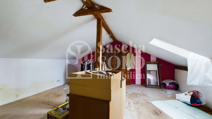 Für Investoren: Wohn- und Geschäftshaus in St. Ingbert – mit Wohnung, Gewerbe, Garten und Garagen