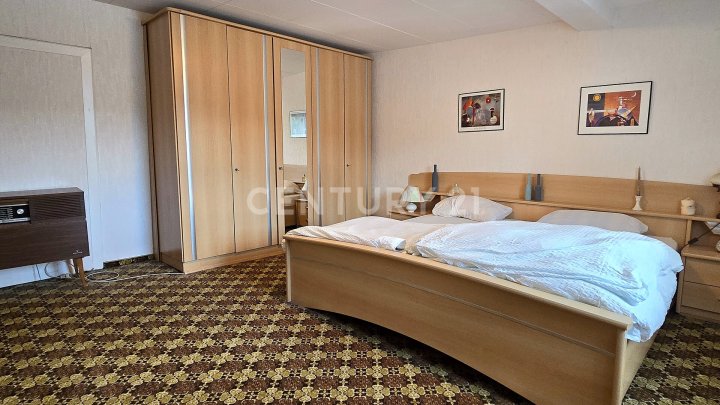 Attraktives Mehrfamilienhaus mit ELW, zusätzl. Baugrundstück und Ausbaumöglichkeit in Quierschied