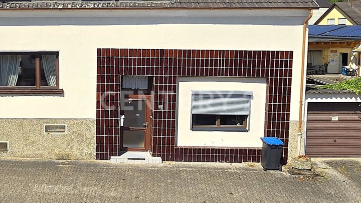 Attraktives Mehrfamilienhaus mit ELW, zusätzl. Baugrundstück und Ausbaumöglichkeit in Quierschied