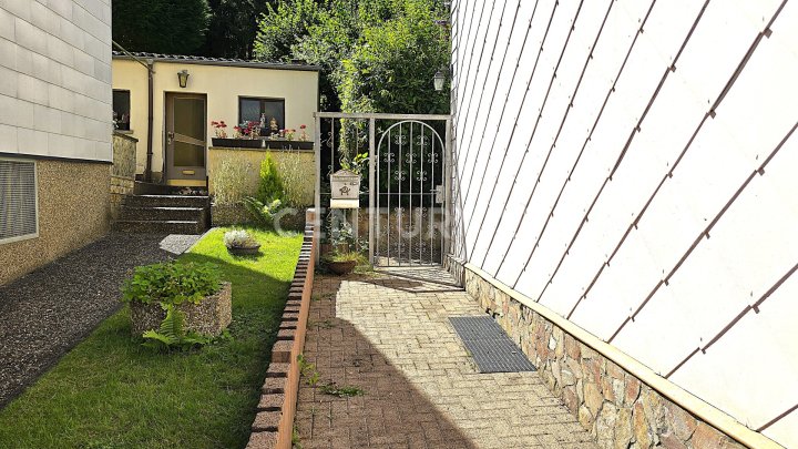 Attraktives Mehrfamilienhaus mit ELW, zusätzl. Baugrundstück und Ausbaumöglichkeit in Quierschied