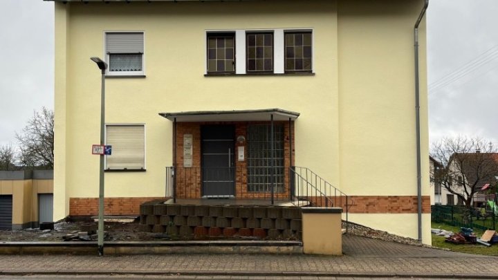Renovierte Eigentumswohnung mit großem Balkon und Garage, sowie Gartenanteil