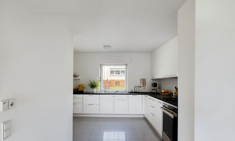 Renovierte Eigentumswohnung mit großem Balkon und Garage, sowie Gartenanteil