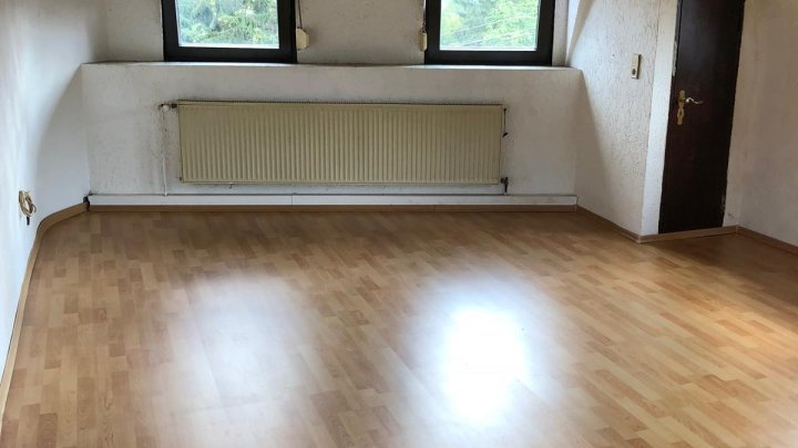 Dreiparteien Wohn- und Geschäftshaus mit Vermietungspotenzial