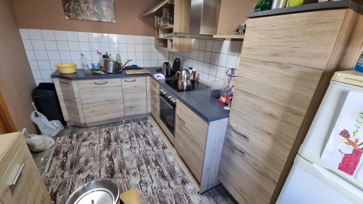 Vermietetes Dreiparteienhaus mit 5 Garagen in verkehrsberuhigter Nebenstraße von Riegelsberg