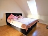 Schlafzimmer der Dachgeschoss Wohnung