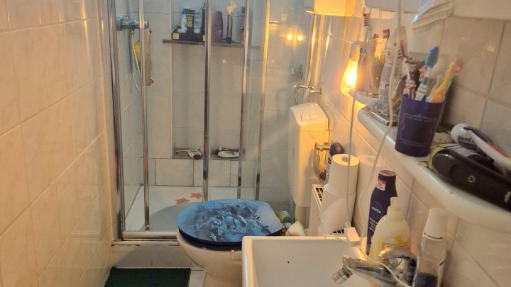 4-Familienhaus mit 3 Garagen und Garten als Rendite oder Eigennutzung