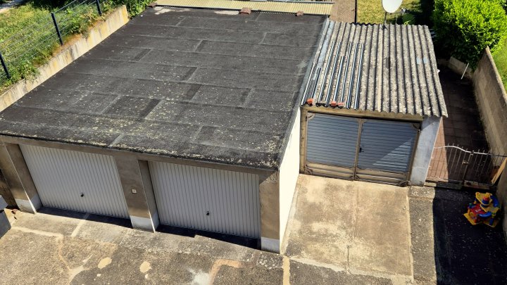 4-Familienhaus mit 3 Garagen und Garten als Rendite oder Eigennutzung