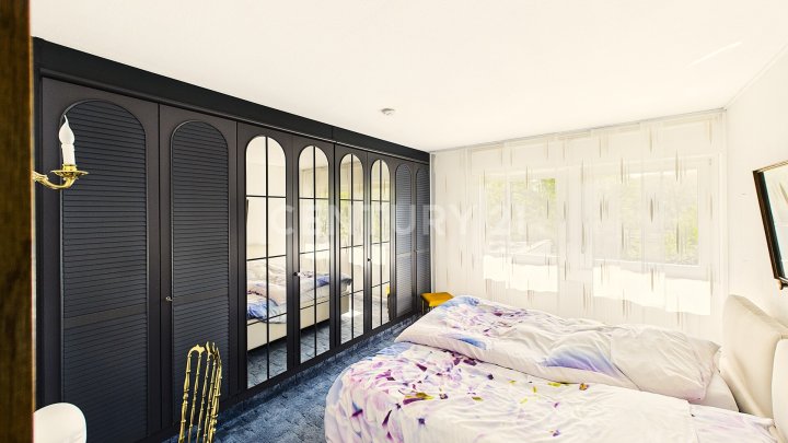 Attraktiver großer Bungalow mit ELW, Garten, 2 Garagen und Weiher in privilegierter Wohnlage