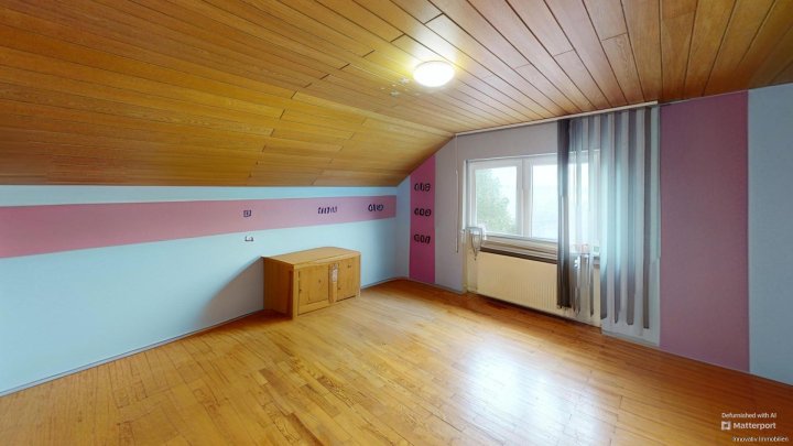 Ruhig gelegenes Zweifamilienhaus mit schöner Gartenanlage & Weitblick