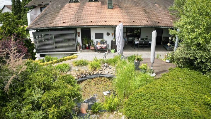 Ein Architekten-Wunder in Bestlage – Exklusive Villa mit Parkgarten und Wellness-Oase