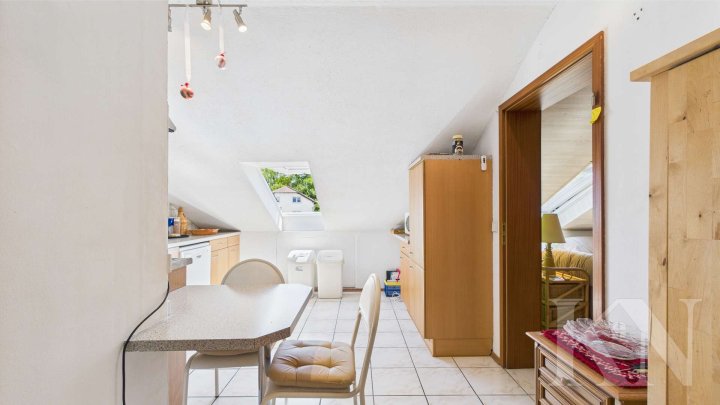 Gemütliche Dachgeschosswohnung mit Fußbodenheizung – Ideal für Eigennutzer & Investoren
