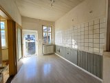Küche der Wohnung im EG mit Zugang zum Garten 
