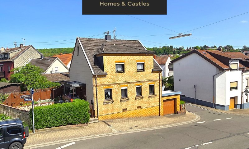 Gemütliches freistehendes Einfamilienhaus mit Terrasse, Garten und Garage in Dudweiler
