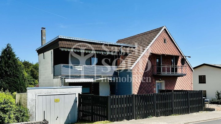 Freistehendes Zweifamilienhaus - teilweise saniert - mit Garten in guter Lage von St. Ingbert
