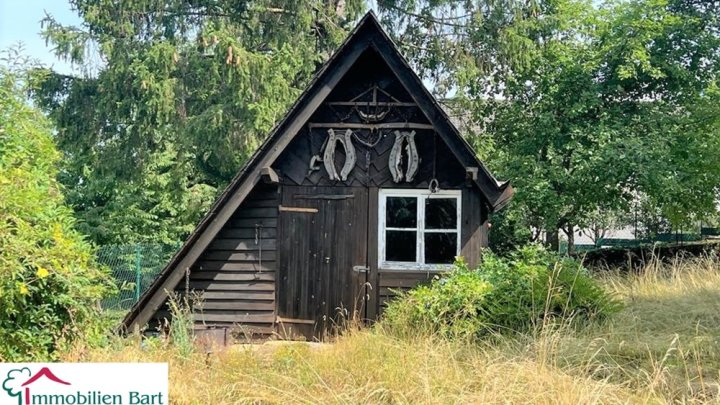 BAUGRUNDSTÜCK + 3 WOHNUNGEN MIT GARTEN UND GARAGEN IN PERL-NENNIG!
