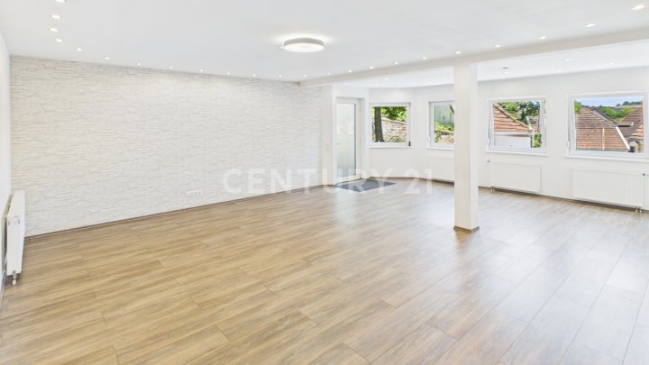 Urbanes Wohnen mit Loft-Charakter – stilvolle Wohnung mit großer Terrasse im Herzen von Neunkirchen