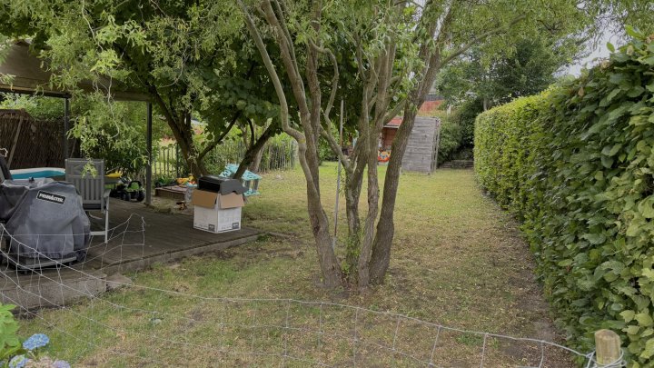 Kleines gemütliches teilsaniertes Reihenendhaus mit schönem Garten in ruhiger Lage
