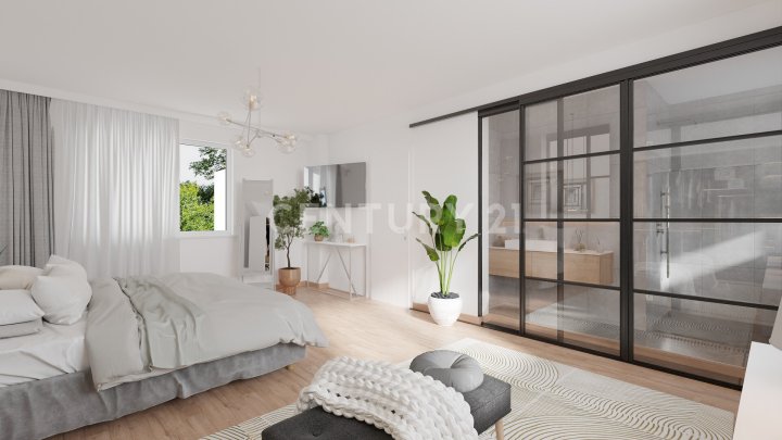 Charmante Dachgeschosswohnung mit Balkon und Gartenzugang